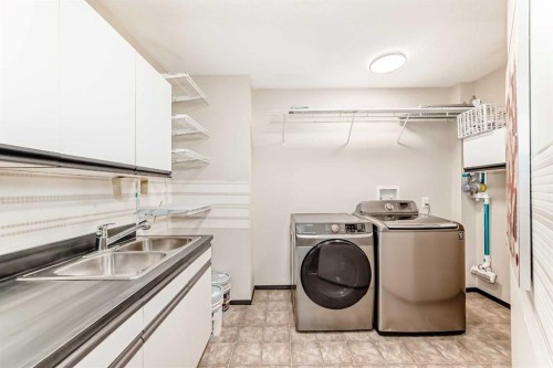 5 Chinook Crescent, Beiseker, AB - Indoor Photo Showing Laundry Room