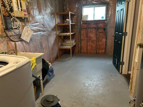 44 Wildrose Crescent West, Brooks, AB - Indoor Photo Showing Basement