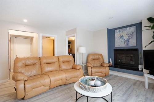 5 Fairview Crescent East, Brooks, AB - Indoor Photo Showing Living Room With Fireplace