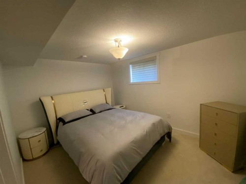 564 5 Street West, Brooks, AB - Indoor Photo Showing Bedroom