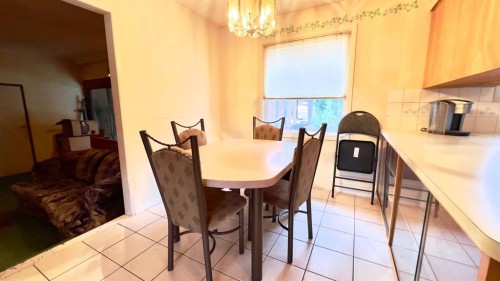 607 7 Avenue West, Hanna, AB - Indoor Photo Showing Dining Room