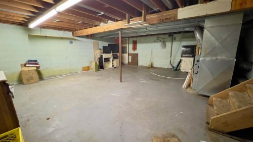 607 7 Avenue West, Hanna, AB - Indoor Photo Showing Basement