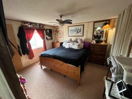 331 Gleichen Street, Gleichen, AB - Indoor Photo Showing Bedroom