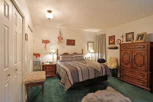 28 Parkland Place E, Brooks, AB - Indoor Photo Showing Bedroom