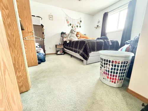 5 Garrow Crescent East, Brooks, AB - Indoor Photo Showing Bedroom
