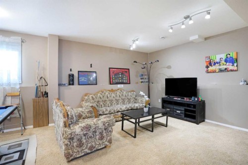 11 Upland Bay West, Brooks, AB - Indoor Photo Showing Living Room