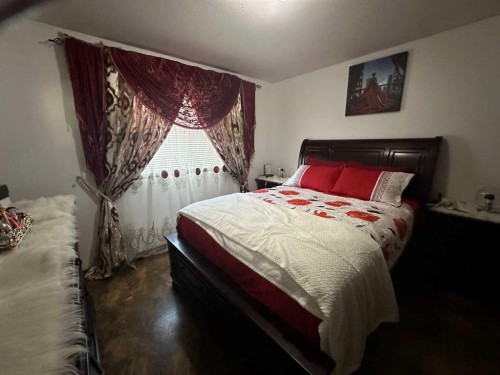 200 Upland Boulevard West, Brooks, AB - Indoor Photo Showing Bedroom