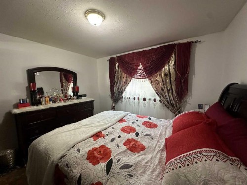 200 Upland Boulevard West, Brooks, AB - Indoor Photo Showing Bedroom