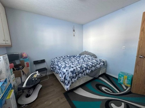 200 Upland Boulevard West, Brooks, AB - Indoor Photo Showing Bedroom