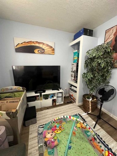 200 Upland Boulevard West, Brooks, AB - Indoor Photo Showing Other Room