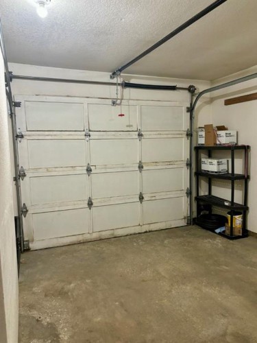 32 Ramsey Close, Red Deer, AB - Indoor Photo Showing Garage