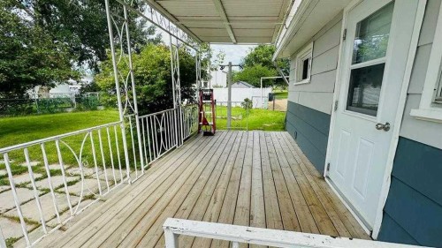 1133 300 Newcastle Place, Drumheller, AB - Outdoor With Deck Patio Veranda With Exterior