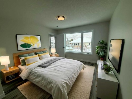 22 Garden Way, Drumheller, AB - Indoor Photo Showing Bedroom