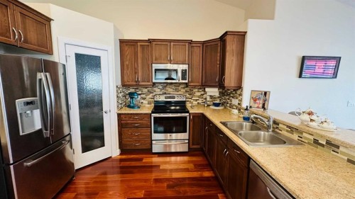 17 Garden Way, Drumheller, AB - Indoor Photo Showing Kitchen With Stainless Steel Kitchen With Double Sink