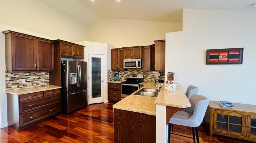 17 Garden Way, Drumheller, AB - Indoor Photo Showing Kitchen With Stainless Steel Kitchen With Double Sink
