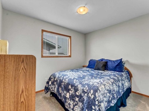 123 Upland Road West, Brooks, AB - Indoor Photo Showing Bedroom