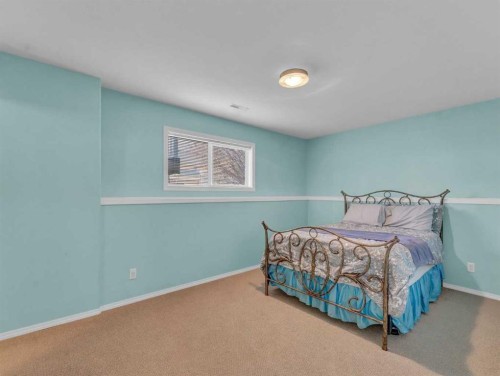 123 Upland Road West, Brooks, AB - Indoor Photo Showing Bedroom