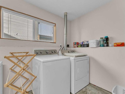123 Upland Road West, Brooks, AB - Indoor Photo Showing Laundry Room
