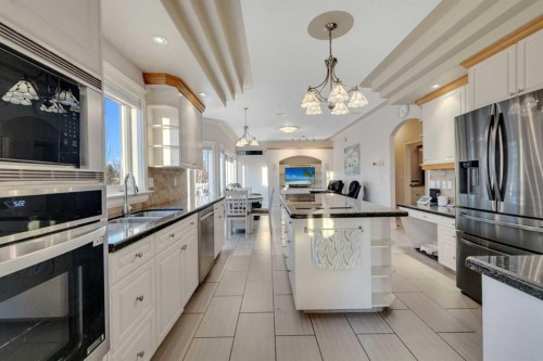 25 Ashmore Close, Red Deer, AB - Indoor Photo Showing Kitchen With Double Sink With Upgraded Kitchen