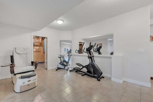 25 Ashmore Close, Red Deer, AB - Indoor Photo Showing Gym Room