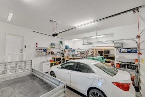 25 Ashmore Close, Red Deer, AB - Indoor Photo Showing Garage