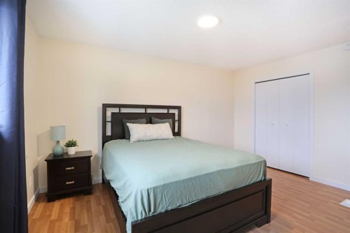 63 Ash Street West, Brooks, AB - Indoor Photo Showing Bedroom