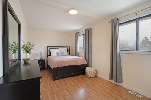 63 Ash Street West, Brooks, AB - Indoor Photo Showing Bedroom