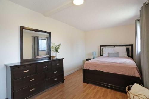 63 Ash Street West, Brooks, AB - Indoor Photo Showing Bedroom