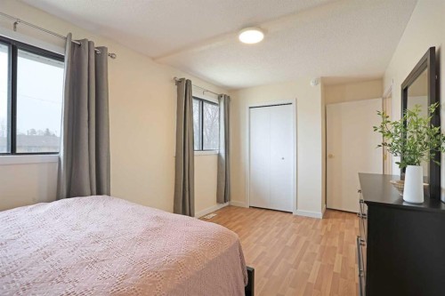 63 Ash Street West, Brooks, AB - Indoor Photo Showing Bedroom