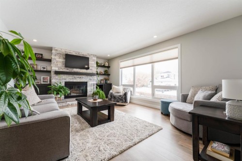 248 5 Street, Drumheller, AB - Indoor Photo Showing Living Room With Fireplace