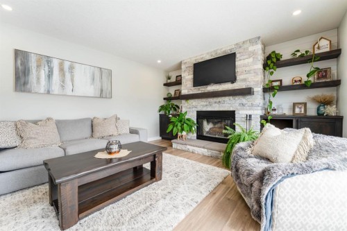 248 5 Street, Drumheller, AB - Indoor Photo Showing Living Room With Fireplace