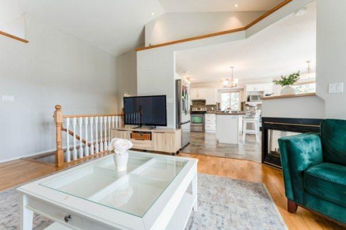 85 Michichi Drive, Drumheller, AB - Indoor Photo Showing Living Room With Fireplace