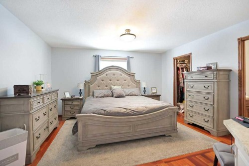 75 Upland, Brooks, AB - Indoor Photo Showing Bedroom