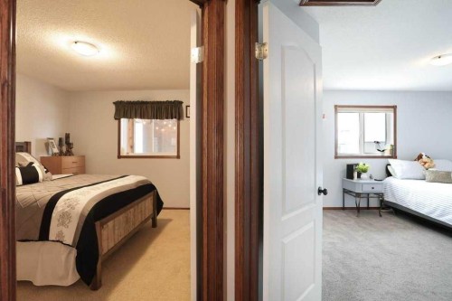 75 Upland, Brooks, AB - Indoor Photo Showing Bedroom