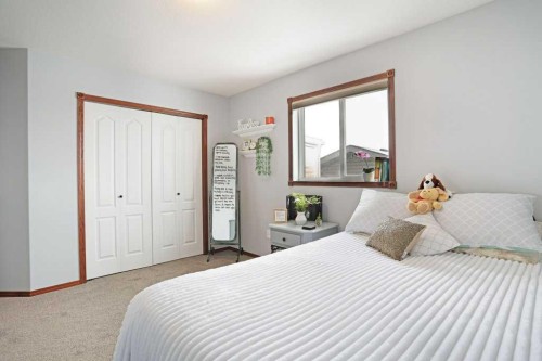 75 Upland, Brooks, AB - Indoor Photo Showing Bedroom