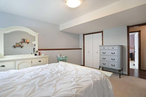 75 Upland, Brooks, AB - Indoor Photo Showing Bedroom