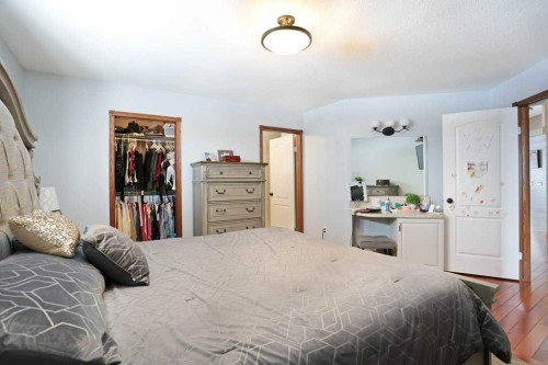 75 Upland, Brooks, AB - Indoor Photo Showing Bedroom