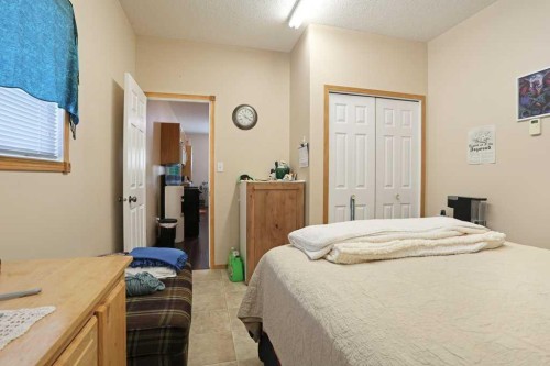 75 Upland, Brooks, AB - Indoor Photo Showing Bedroom