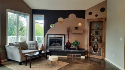 2070 Newcastle Trail, Drumheller, AB - Indoor Photo Showing Living Room With Fireplace