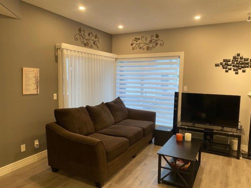 131 Bridlewood View Sw, Calgary, AB - Indoor Photo Showing Living Room