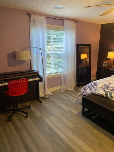 131 Bridlewood View Sw, Calgary, AB - Indoor Photo Showing Bedroom