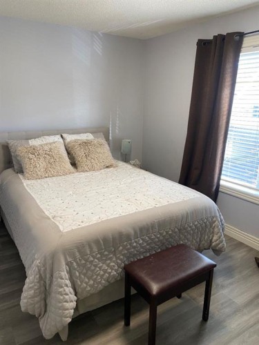 131 Bridlewood View Sw, Calgary, AB - Indoor Photo Showing Bedroom