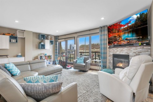 5221 Westridge Drive, Blackfalds, AB - Indoor Photo Showing Living Room With Fireplace
