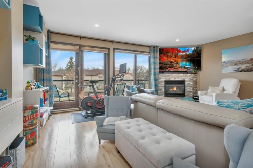 5221 Westridge Drive, Blackfalds, AB - Indoor Photo Showing Living Room With Fireplace