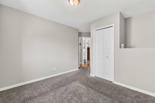 76 Crystalridge Crescent, Okotoks, AB - Indoor Photo Showing Other Room