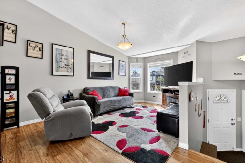 76 Crystalridge Crescent, Okotoks, AB - Indoor Photo Showing Living Room