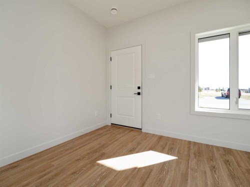 7042 48 Street, Taber, AB - Indoor Photo Showing Other Room