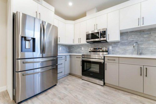 157 10 Avenue Se, Drumheller, AB - Indoor Photo Showing Kitchen With Stainless Steel Kitchen With Upgraded Kitchen