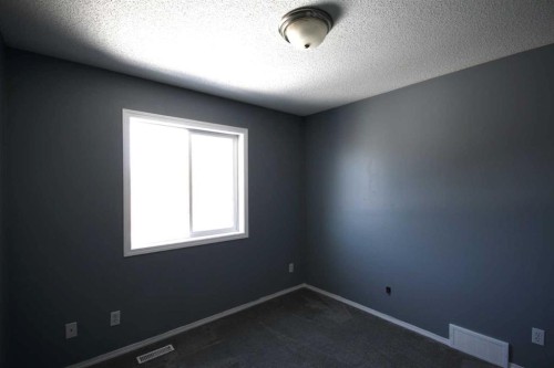 309 Bridleridge Way Sw, Calgary, AB - Indoor Photo Showing Other Room