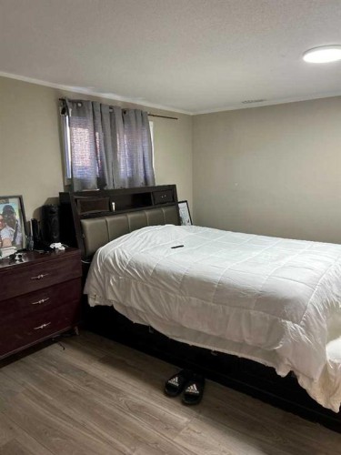 1708 2Nd Avenue East, Brooks, AB - Indoor Photo Showing Bedroom